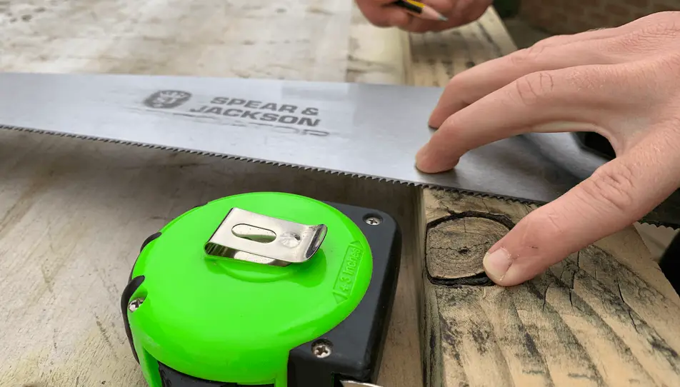 Saw and tape measure