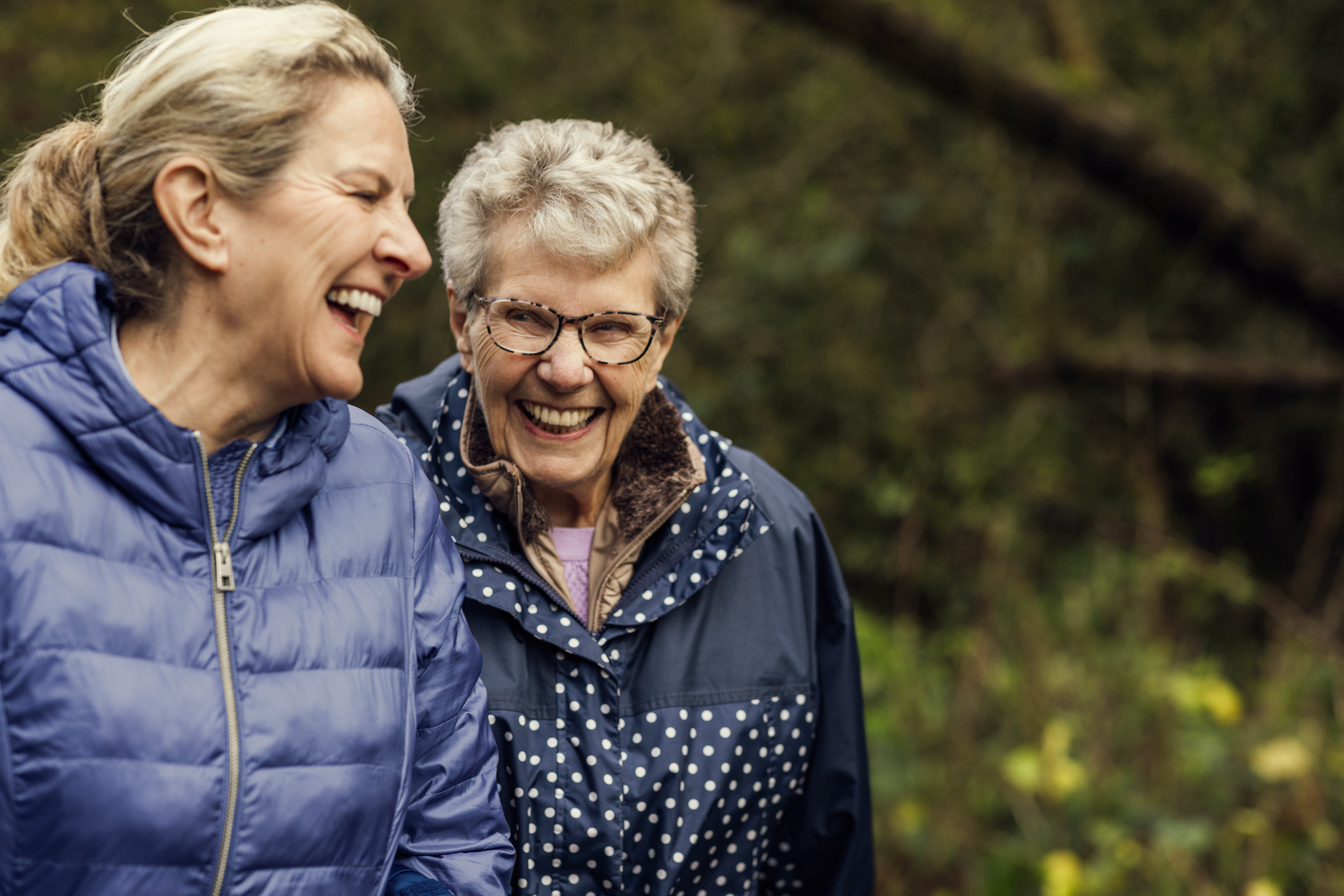 parent and carer walking outside 