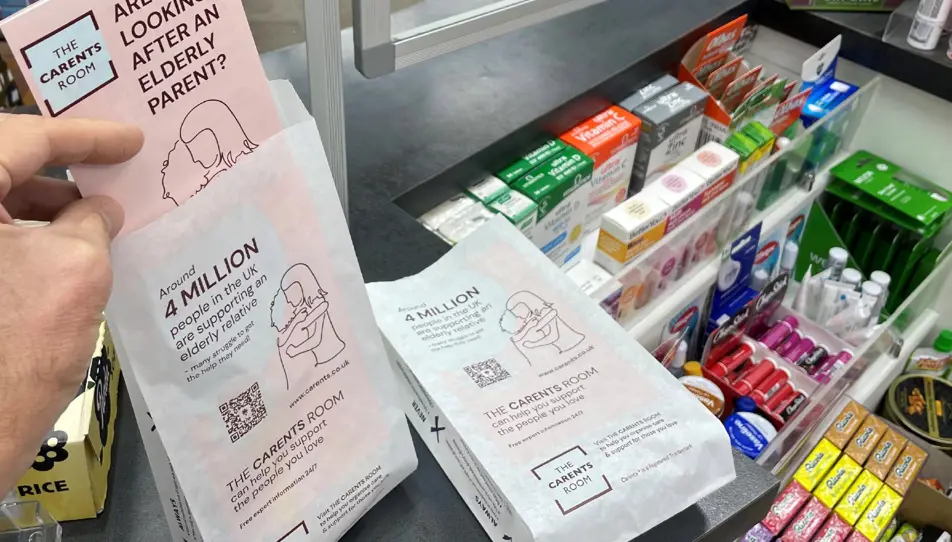 Carents pharmacy bags on a pharmacy counter