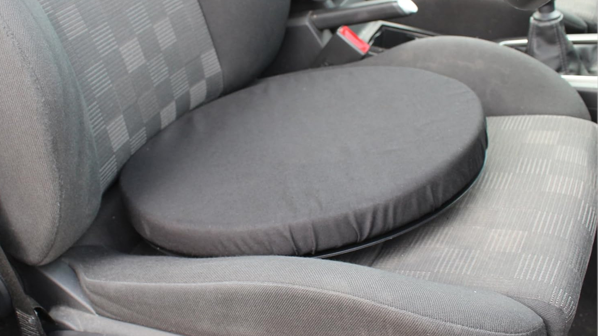 Rotating car seat cushion placed on a standard car seat – helps elderly parents turn more easily when getting in and out of the car, reducing strain on hips, back, and knees.