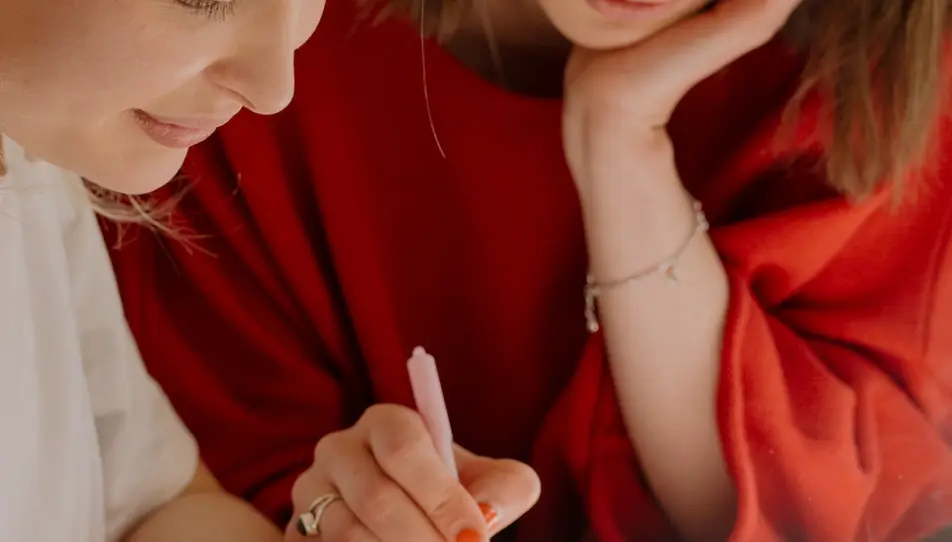 Two people working on a problem
