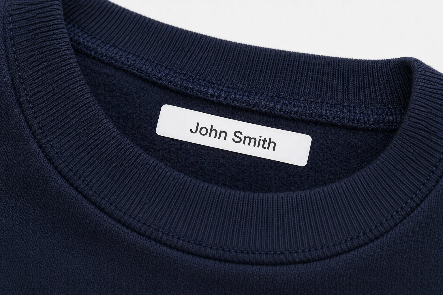 Name Label saying John Smith