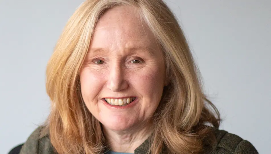 Dr Jackie Gray, founder of Carents, smiling during an interview about choosing a care home, as featured on BBC Radio